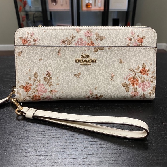 Coach Handbags - COACH - ACCORDION ZIP WALLET WITH BOUQUET PRINT
